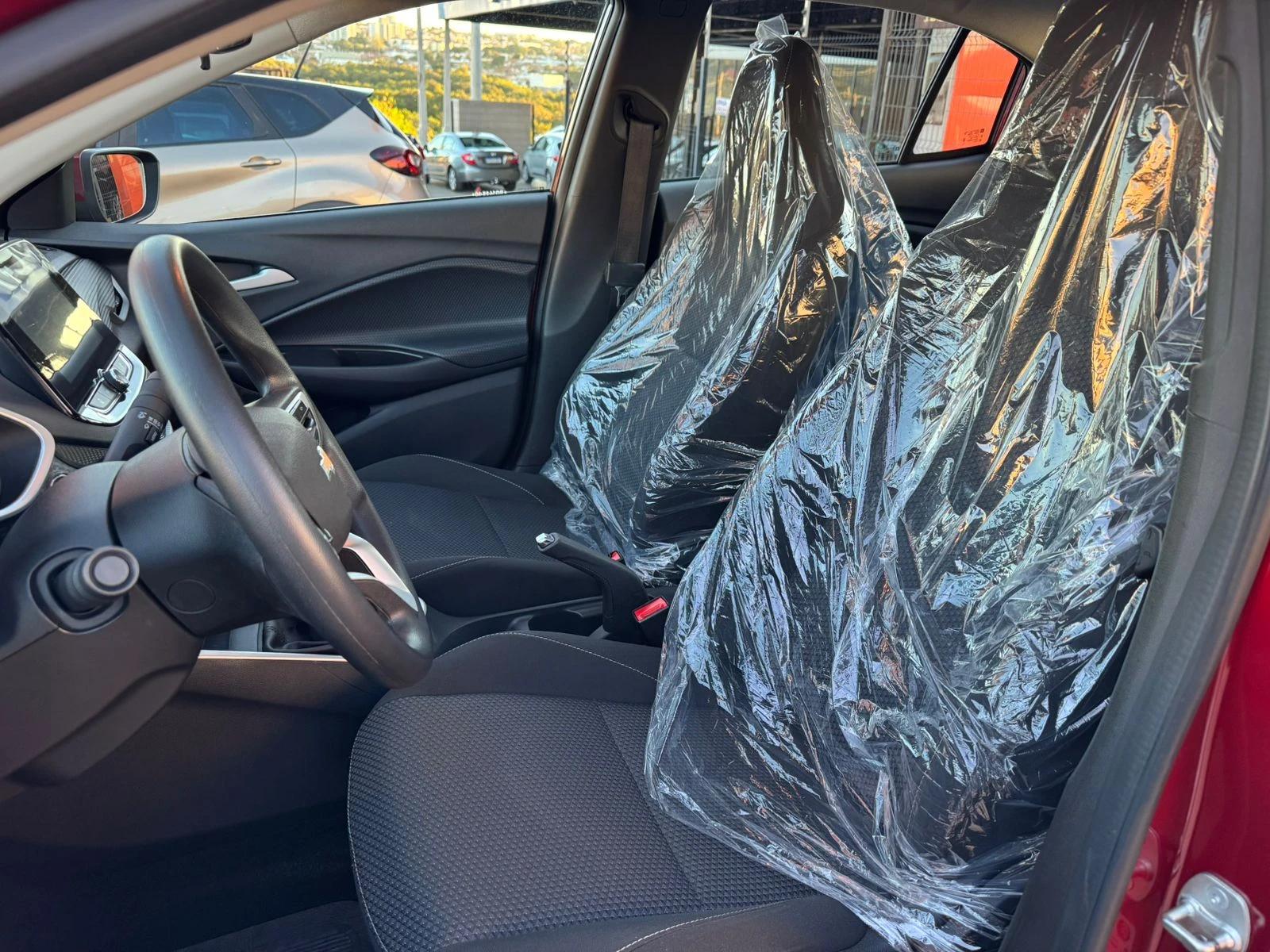 CHEVROLET Onix Hatch - Foto