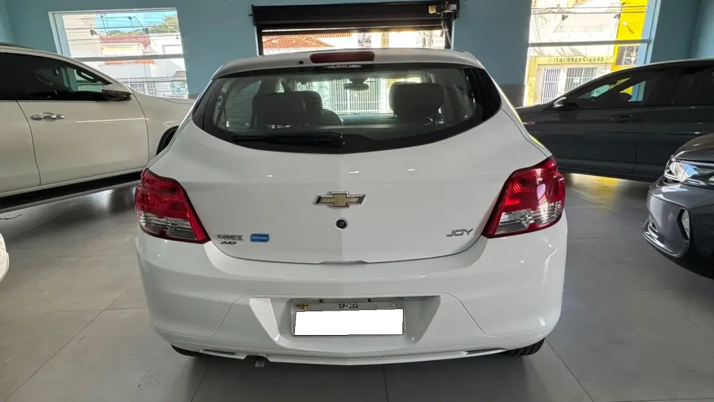 CHEVROLET Onix Hatch - Foto