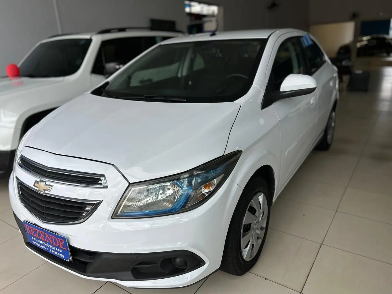 CHEVROLET Onix Hatch - Foto