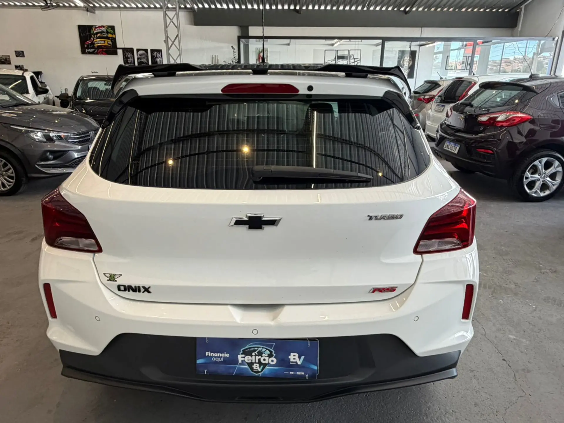 CHEVROLET Onix Hatch - Foto