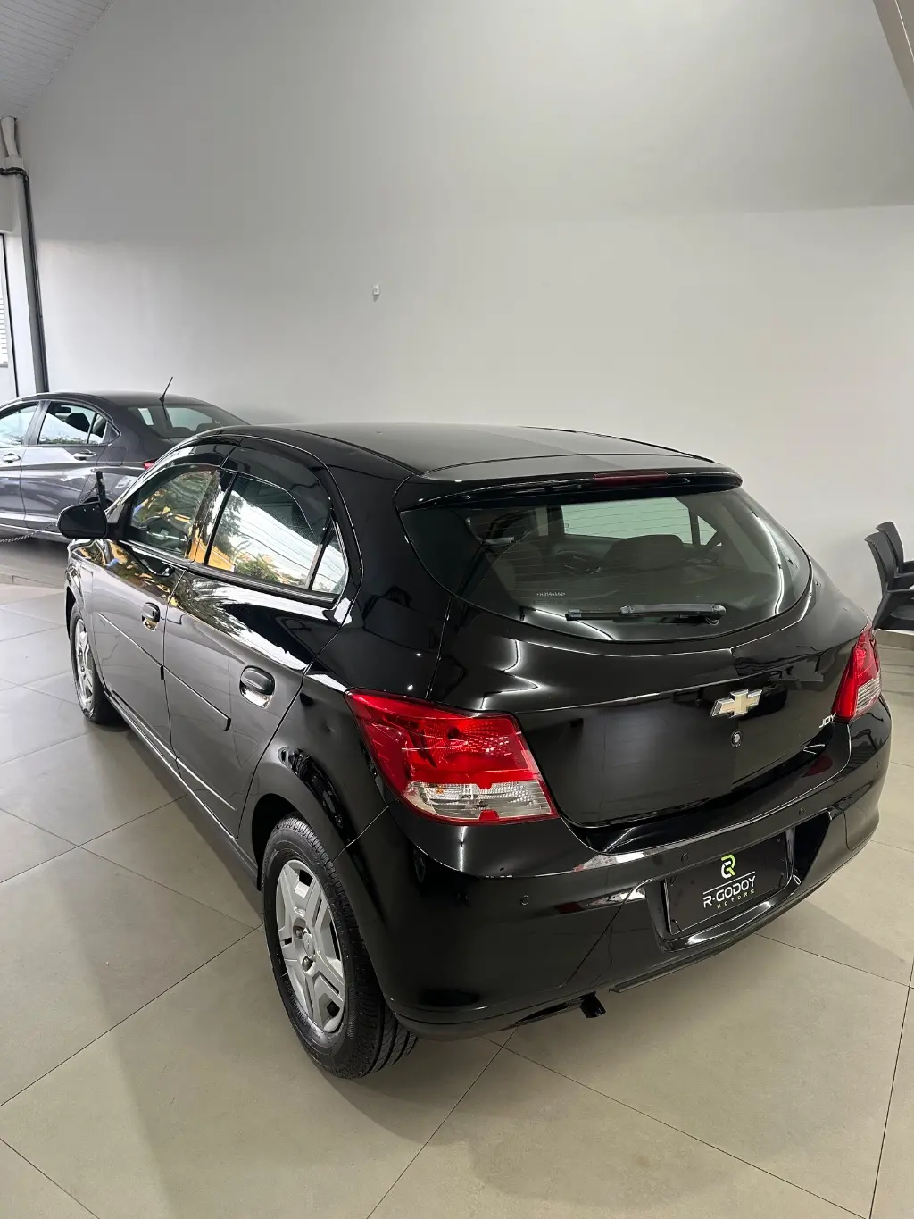 CHEVROLET Onix Hatch - Foto