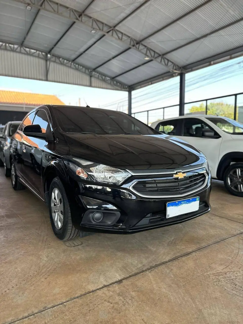 CHEVROLET Onix Hatch - Foto