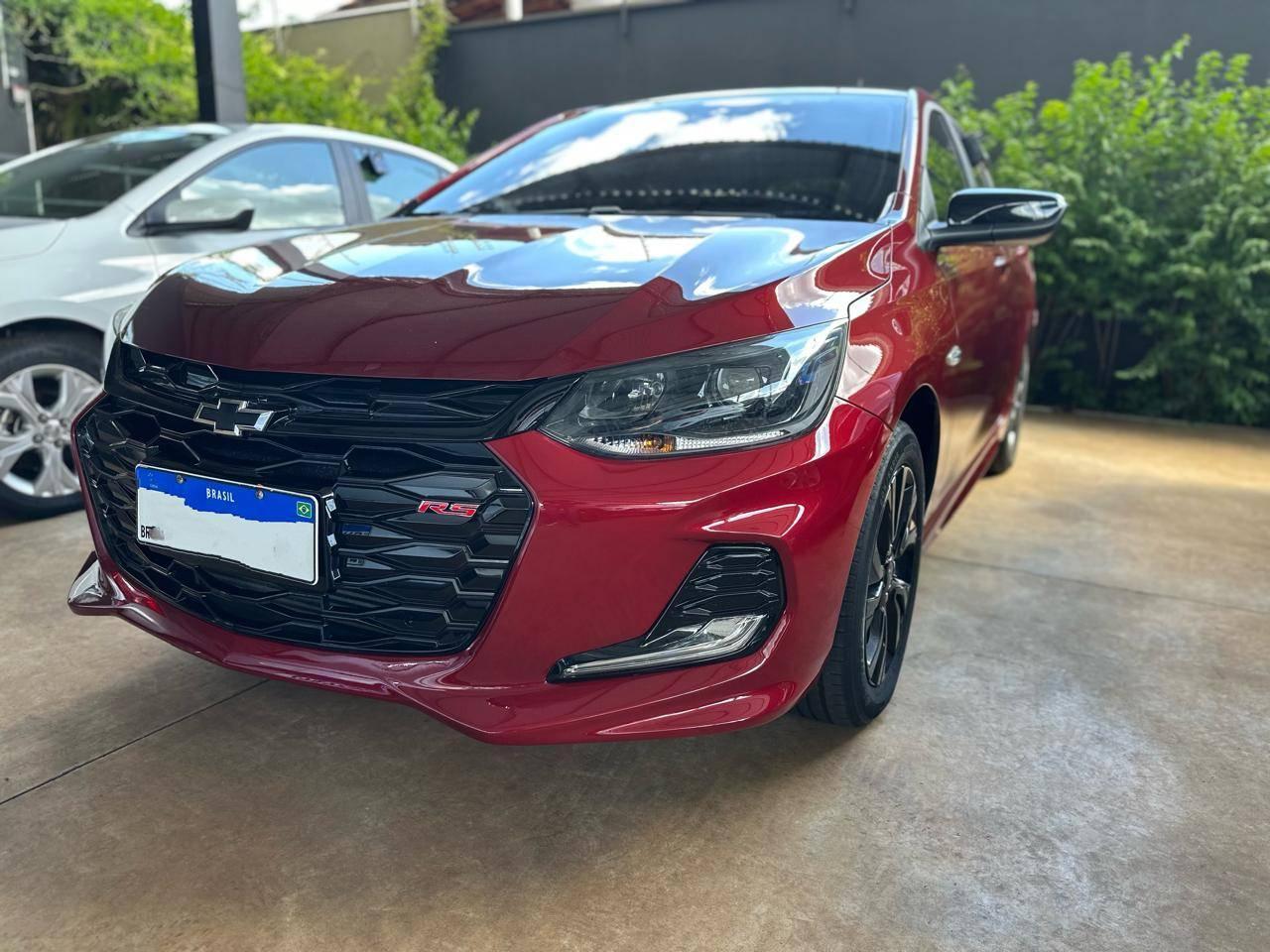 CHEVROLET Onix Hatch - Foto