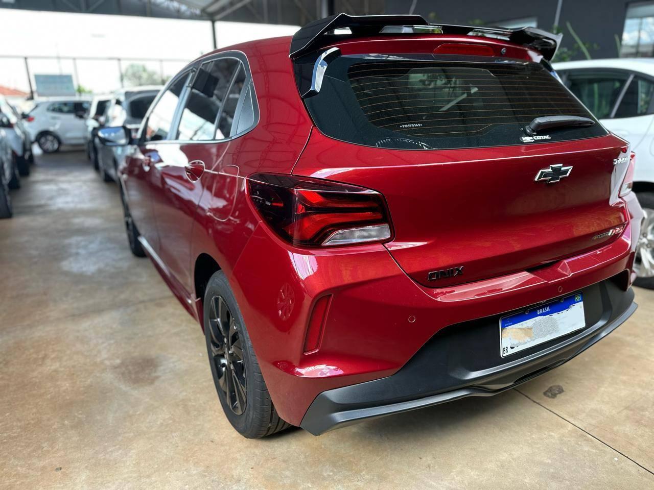 CHEVROLET Onix Hatch - Foto